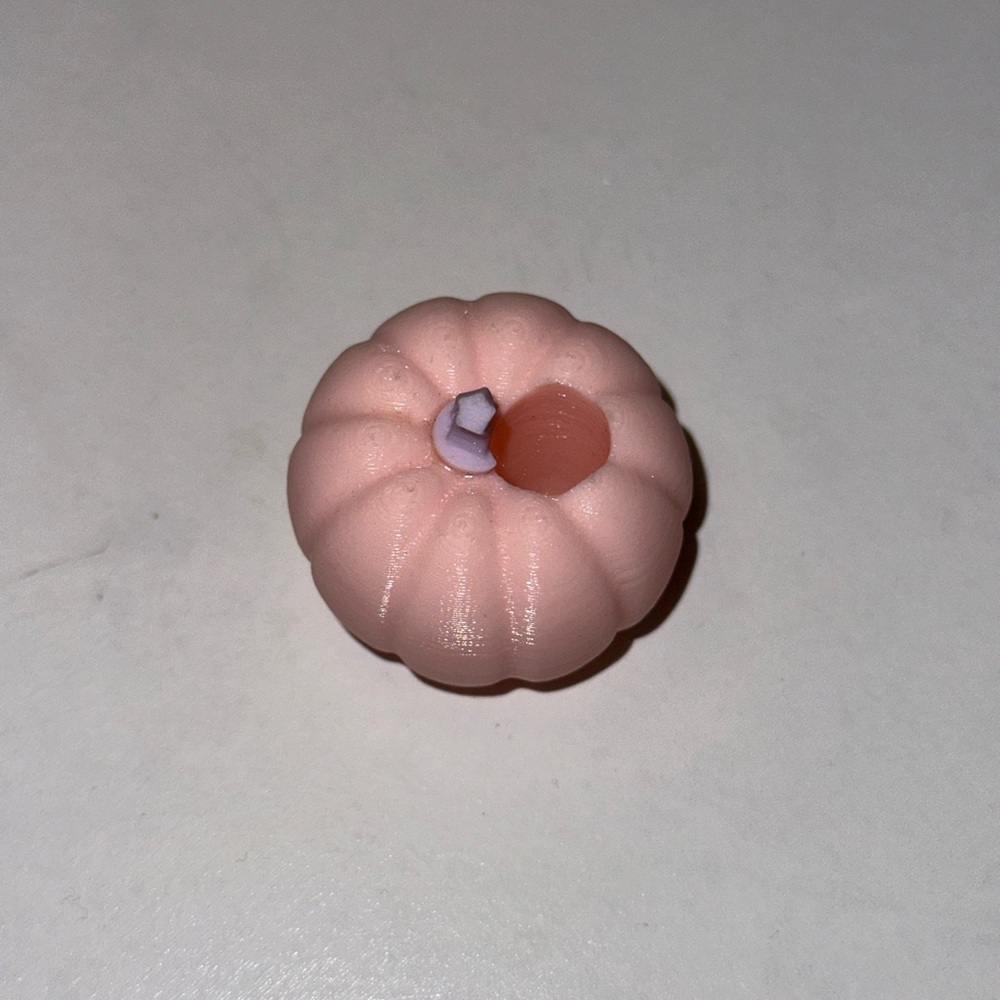 pumpkin straw charm.